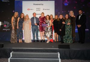 HSBC UK, first direct bank and M&S Bank, Winners of Most Menopause Friendly Environment on stage with Louise Minchin at The Menopause Friendly Employer Awards 2022