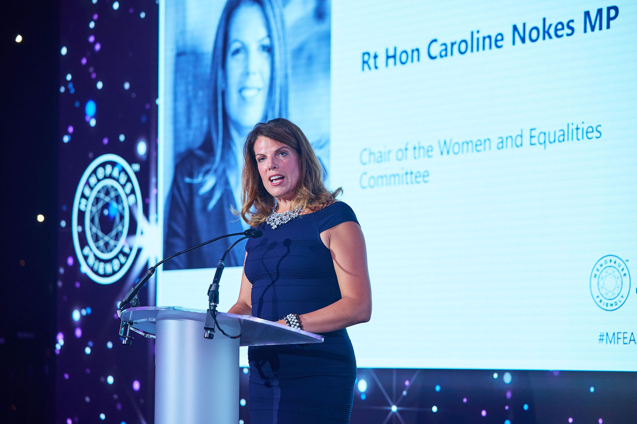 The Rt Hon Caroline Nokes MP addressing the audience on stage at The Menopause Friendly Employer Awards 2023