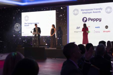 Lisa Snowdon, Chad and Daisy Lazarus on stage at The Menopause Friendly Employer Awards 2024 Lisa Snowdon, Chad and Daisy Lazarus on stage at The Menopause Friendly Employer Awards 2024